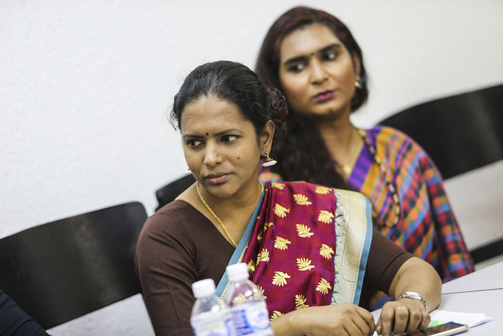 Founder PKKUM, Elisha Kor Krishnan (left) addresses a press conference in Kuala Lumpur August 24, 2018. — Picture by Hari Anggara