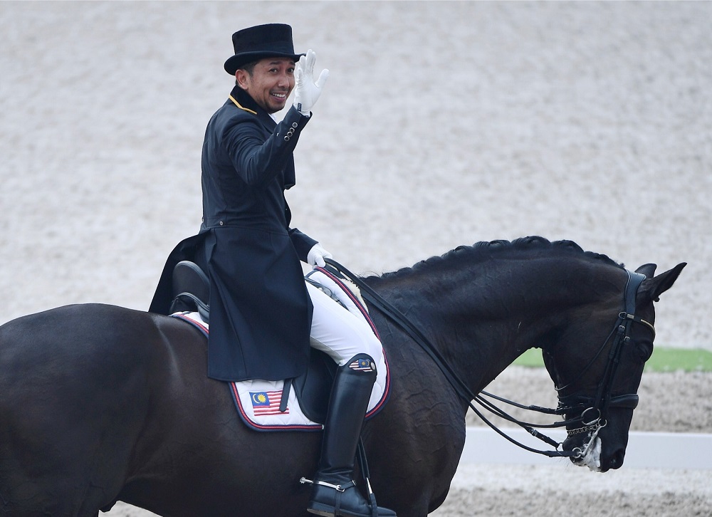 Mohd Qabil displayed a brilliant performance along with his steed Rosenstolz to earn 76.620 points but failed to beat Hong Kongu00e2u20acu2122s Wing Ying Siu, who bagged a gold medal with 77.045 points. u00e2u20acu201d Bernama pic