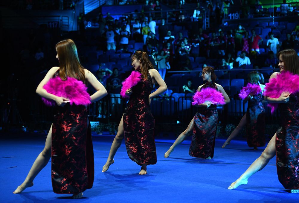 Dancers performing during the Badminton World Championships in Nanjing, August 5, 2018. Pom-pom girls strut their stuff, pop music reverberates around the arena and a u00e2u20acu02dckiss camu00e2u20acu2122 trains its sights on the next unsuspecting couple. u00e2u20acu201d AFP pic