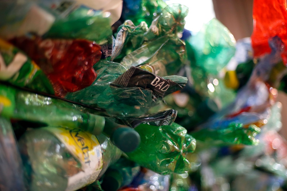 Plastic bottles and containers are put aside at the sorting centre of Parisian waste management company Syctom, on August 27, 2015, in Sevran, near Paris. u00e2u20acu201d AFP pic