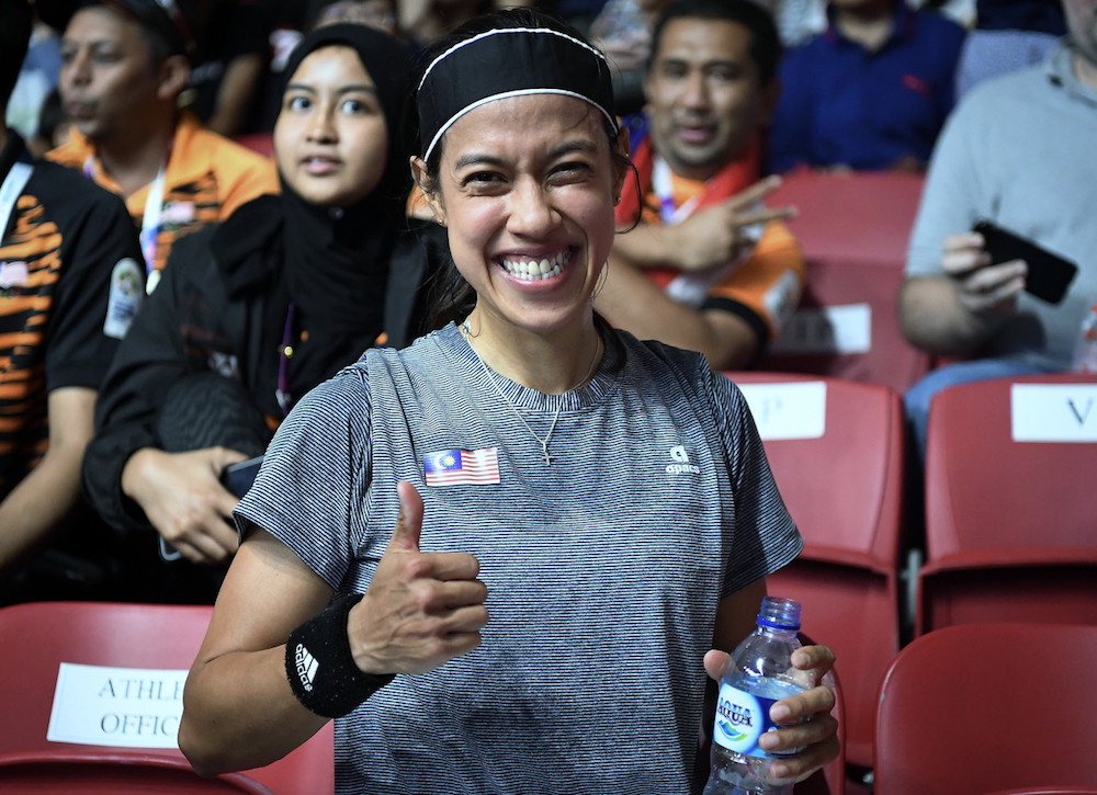 Datuk Nicol David celebrates after defeating Indiau00e2u20acu2122s Dipika Pallikal in the womenu00e2u20acu2122s semi-finals at the 2018 Asian Games in Jakarta August 25, 2018. u00e2u20acu201d Bernama pic