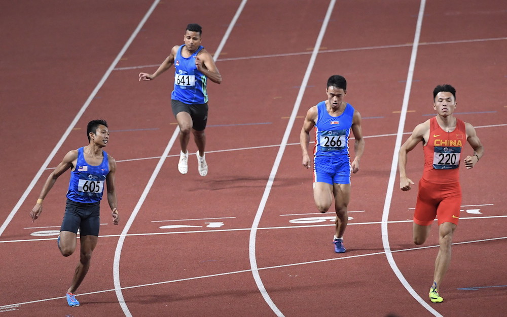 Khairul Hafiz Jantan participates in heats for the 100-metre sprint at the 2018 Asian Games in Jakarta August 25, 2018. u00e2u20acu201d Bernama pic