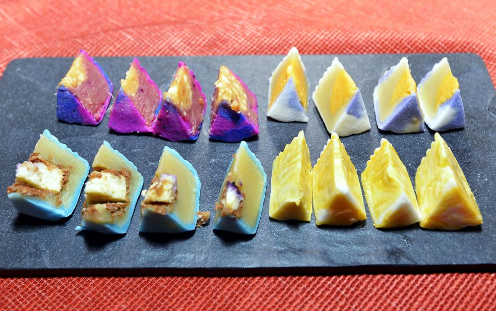 Clockwise from top left: This year’s signature Dragon Blossom mooncake, Flower Drum, Musang King and Blue Moon. — Picture by Ham Abu Bakar