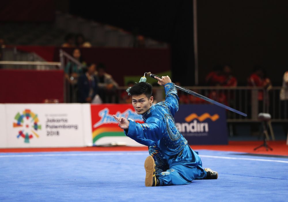 Jack Chang Loh of Malaysia competes in the menu00e2u20acu2122s Taijijian event in Jakarta August 22, 2018. u00e2u20acu201d Reuters pic