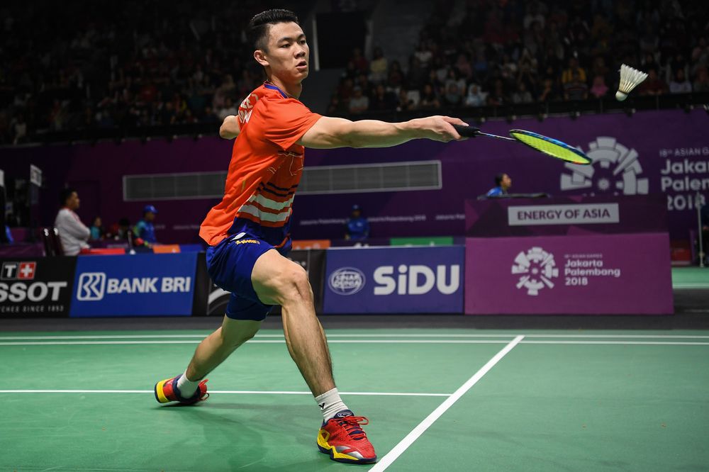 Malaysiau00e2u20acu2122s Lee Zii Jiau00e2u20acu2122s reacts against Kento Nishimoto of Japan during the 2018 Asian Games menu00e2u20acu2122s badminton team event at Istora Senayan Stadium in Jakarta, August 19, 2018. u00e2u20acu201d Bernama pic