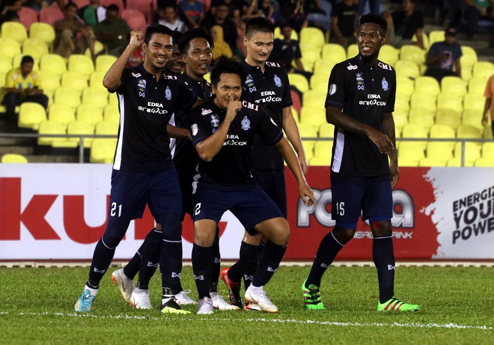 Melaka United players celebrate after scoring a goal against the Royal Malaysian Police (PDRM) at the Hang Jebat Stadium in Melaka August 26, 2018. u00e2u20acu201d Bernama pic