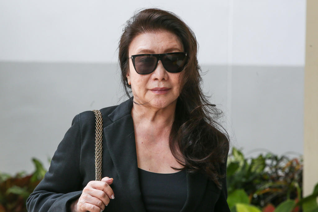 Shi Ka Yee admitted to drink driving and two other separate charges of confining a man in a crane bucket and committing a rash act by driving her vehicle until it came into contact with her neighbour. u00e2u20acu201d TODAY pic 