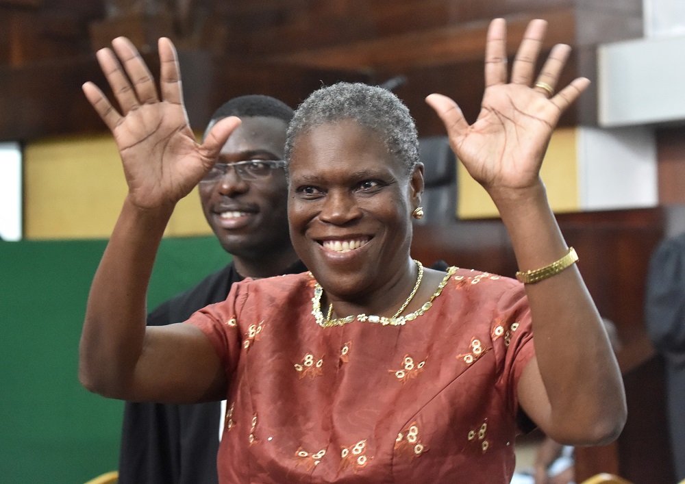 In this file photo taken on May 9, 2016 Ivory Coast's former first lady Simone Gbagbo waves at her supporters as she arrives at Abidjan's courthouse. u00e2u20acu201d AFP pic