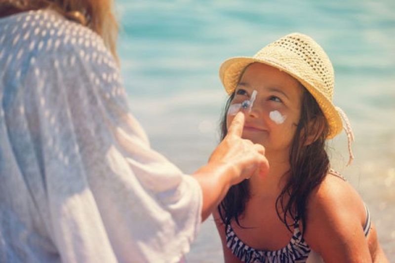 Using sunscreen correctly can help protect the whole family this summer.. u00e2u20acu201d AFP pic