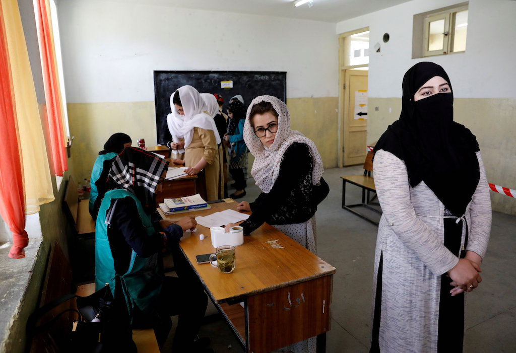 Afghan women arrive at a voter registration centre to register for the upcoming parliamentary and district council elections in Kabul, Afghanistan April 23, 2018. u00e2u20acu201d Reuters pic