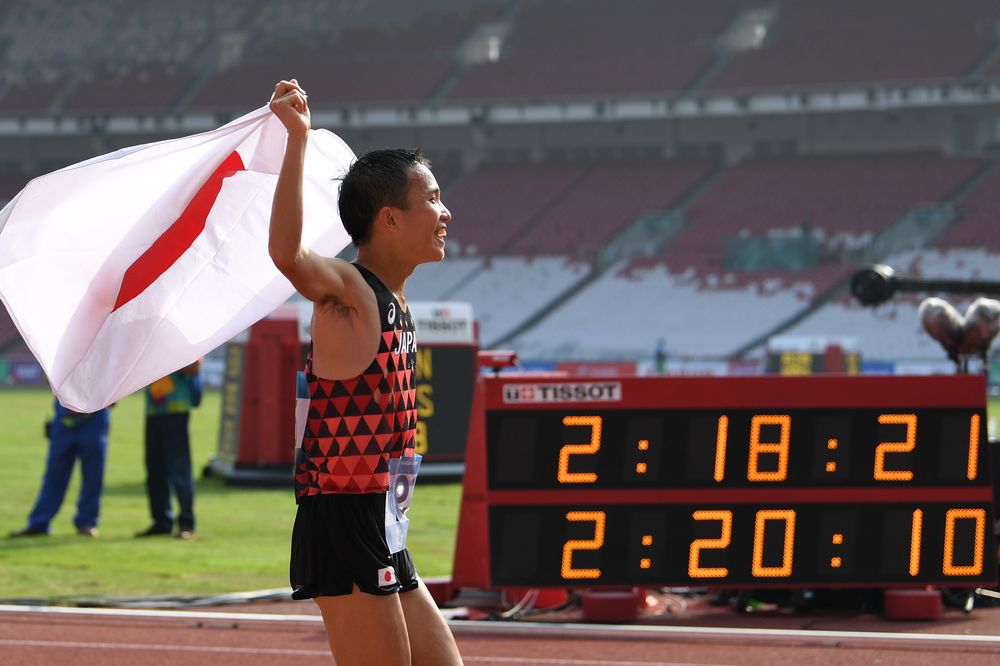 Japanu00e2u20acu2122s Hiroto Inoue celebrates winning the menu00e2u20acu2122s marathon athletics event during the 2018 Asian Games in Jakarta on August 25, 2018. u00e2u20acu201d AFP pic