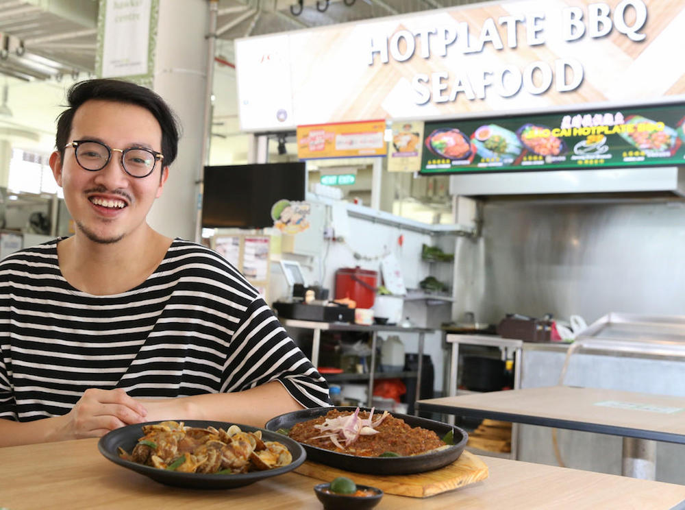 Chew Zhi Jie gave up a cushy nine-to-five job at a bank to be a hawker. He is among a small, but growing number of millennials, who are hoping to breathe new life into the hawker trade in Singapore. u00e2u20acu201d TODAY pic