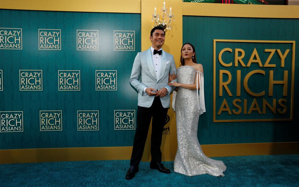 Cast members Henry Golding and Constance Wu pose at the premiere for u00e2u20acu02dcCrazy Rich Asiansu00e2u20acu2122 in Los Angeles August 7, 2018. u00e2u20acu201d Reuters pic