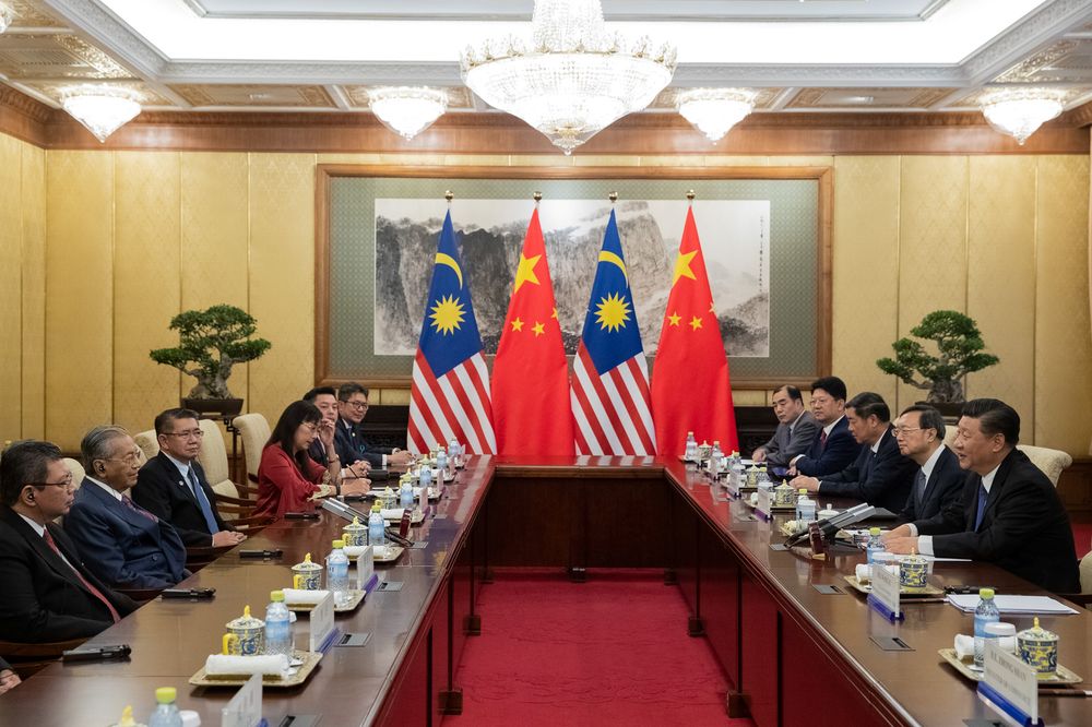 Prime Minister Tun Dr Mahathir Mohamad (second left) and Chinese President Xi Jinping (right) meet at Diaoyutai State Guesthouse in Beijing, China, August 20, 2018. u00e2u20acu201d Reuters pic