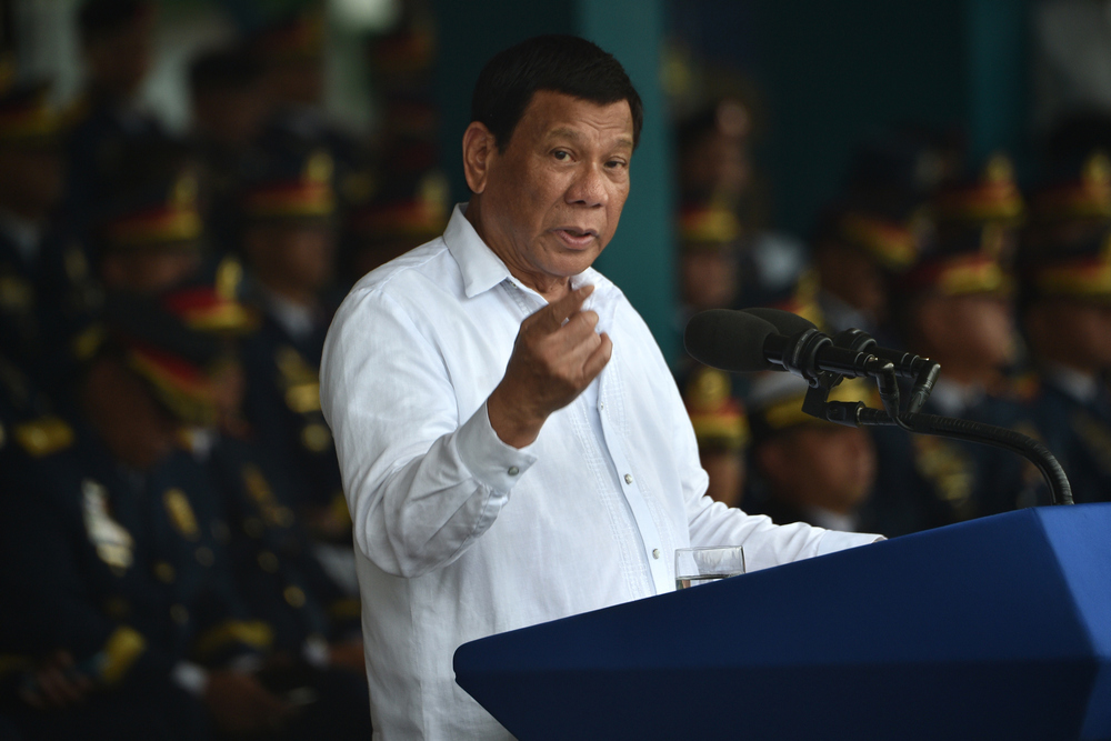 Philippine President Rodrigo Duterte delivers his speech during the 117th police anniversary celebration at the national headquarters in Manila August 8, 2018. u00e2u20acu201d AFP pic