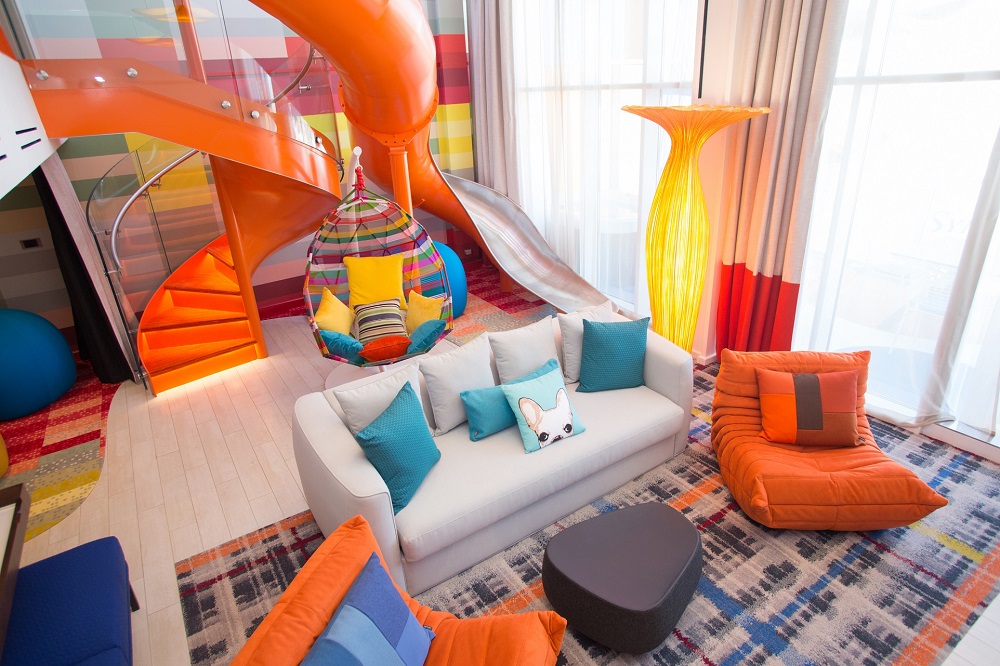 Symphony of the Seasu00e2u20acu2122 Ultimate Family Suite features a slide for kids that connects the second floor to the living room. u00e2u20acu201d Picture courtesy of Royal Caribbean/ SBW-Photo