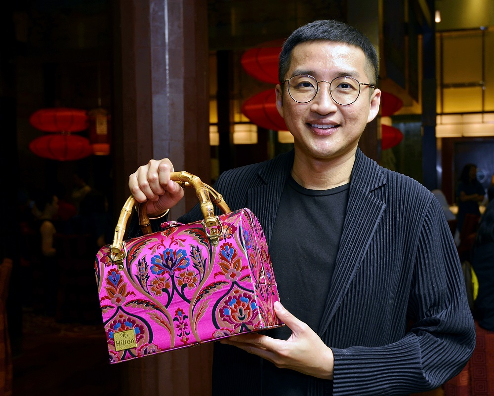 Khoon Hooi used his Fall collection fabrics to design Hilton Kuala Lumpuru00e2u20acu2122s limited-edition mooncake gift boxes. u00e2u20acu201d Picture by Ham Abu Bakar