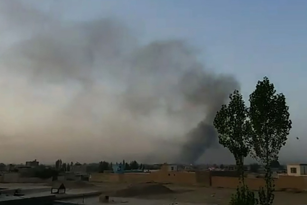 This screen grab taken from AFPTV video on August 10, 2018 shows smoke rising into the air after Taliban militants launched an attack on the Afghan provincial capital Ghazni. u00e2u20acu201d AFP pic