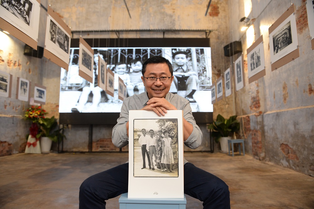 Goh Hun Meng at the 'A Family Memoir @ Khoo Kongsi' exhibition in tribute of his uncle Goh Kong Chuan who took most of the photographs. u00e2u20acu201d Picture by Steven KE Ooi