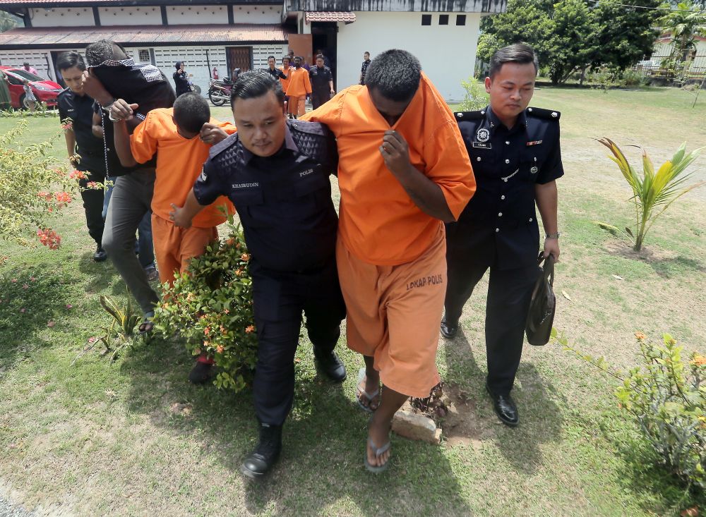 The four were initially charged under Section 456 of the Penal Code for house breaking in the same court on March 9 last year. u00e2u20acu201d Picture by Farhan Najib