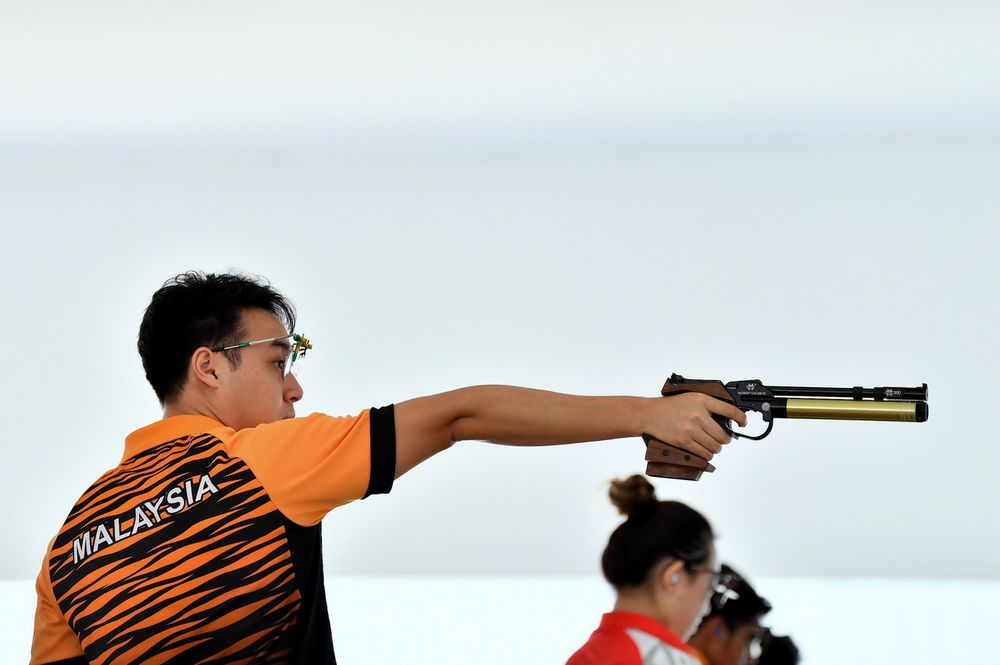 National shooter Johnathan Wong Guanjie during rehearsals in the 10-meter Air Pistol event at the Asian 2018 Games in the Jakabaring Shooting Sports Complex, Palembang, August 18, 2018. u00e2u20acu201d Bernama pic