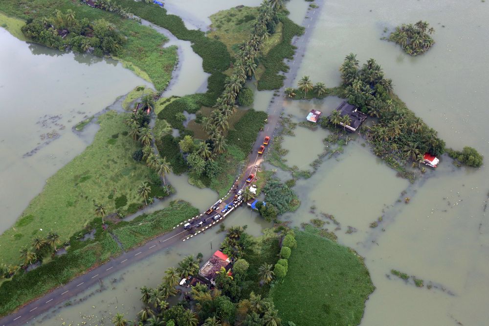 An aerial view shows partially submerged road at a flooded area in the southern state of Kerala August 19, 2018. u00e2u20acu201d Reuters pic