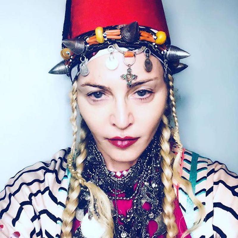 Madonna shared this Facebook post with her fans on Tuesday, with the caption: u00e2u20acu02dcToday I am wearing C A K E on my head!u00e2u20acu2122. u00e2u20acu201d Picture via Facebook/Madonna