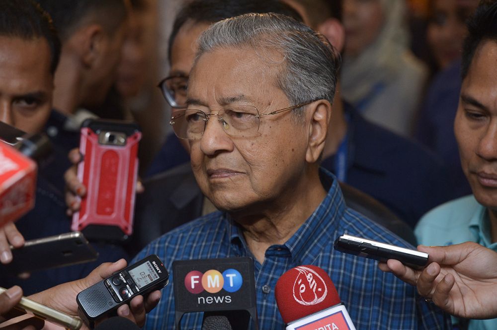 Tun Dr Mahathir Mohamad speaks to reporters after visiting an art exhibition at the Perdana University in Kuala Lumpur August 12, 2018. u00e2u20acu2022 Picture by Mukhriz Hazim