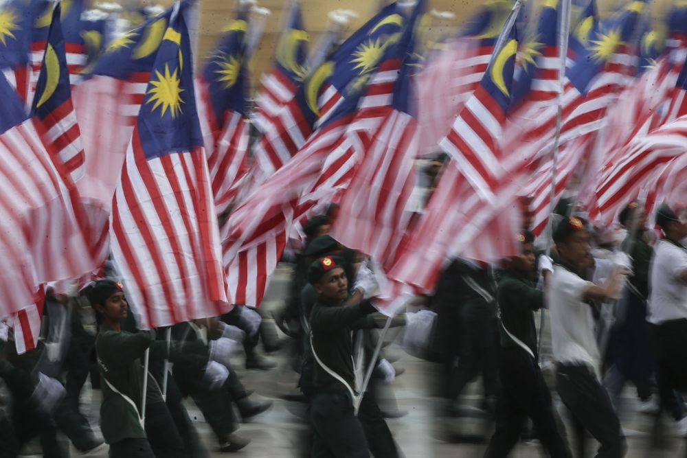 Participants attend a rehearsal in conjunction with the 61st Merdeka Day celebrations in Putrajaya August 28, 2018. u00e2u20acu2022 Picture by Hari Anggara