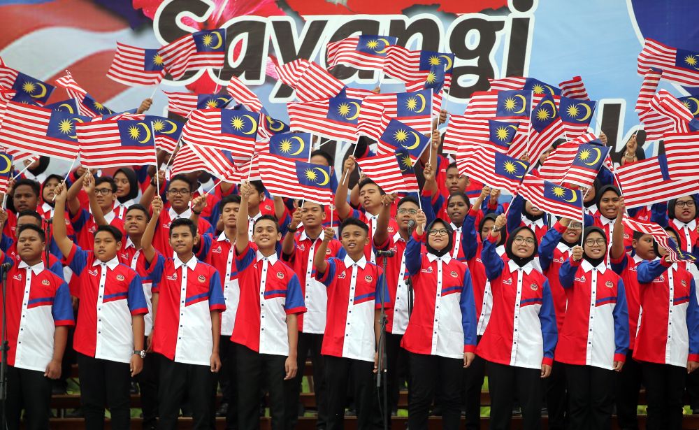 Participants rehearsing for the state-level National Day celebration in front of the Ipoh Town Hall, August 29, 2018. u00e2u20acu2022 Picture by Farhan Najib