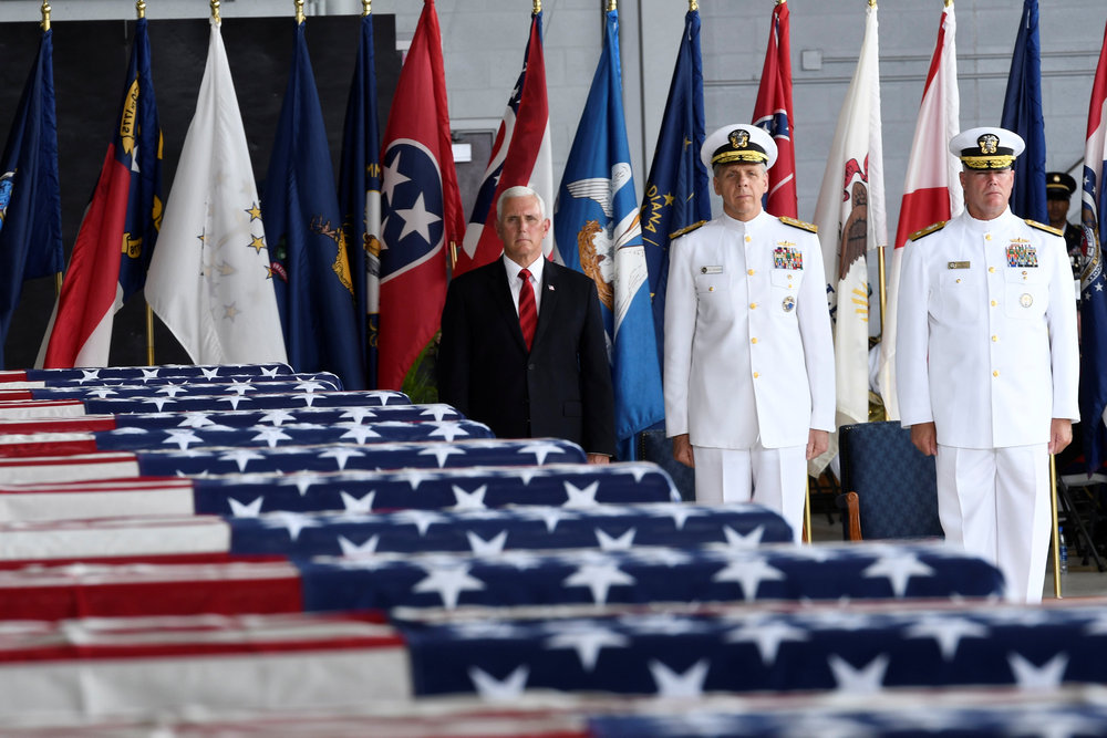 Vice President Mike Pence (left) and Admiral Phil Davidson (centre), US Indo-Pacific Commander, honour the remains of US soldiers from the Korean War in Honolulu, Hawaii August 1, 2018. u00e2u20acu201d Reuters pic