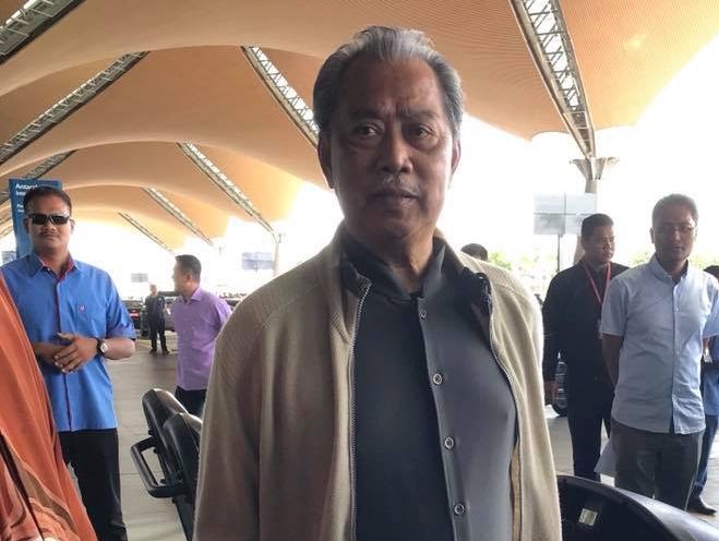 Home Minister Tan Sri Muhyiddin Yassin on his arrival at the Kuala Lumpur International Airport from Singapore today. u00e2u20acu201d Picture courtesy of Hafiz Abdul Halim