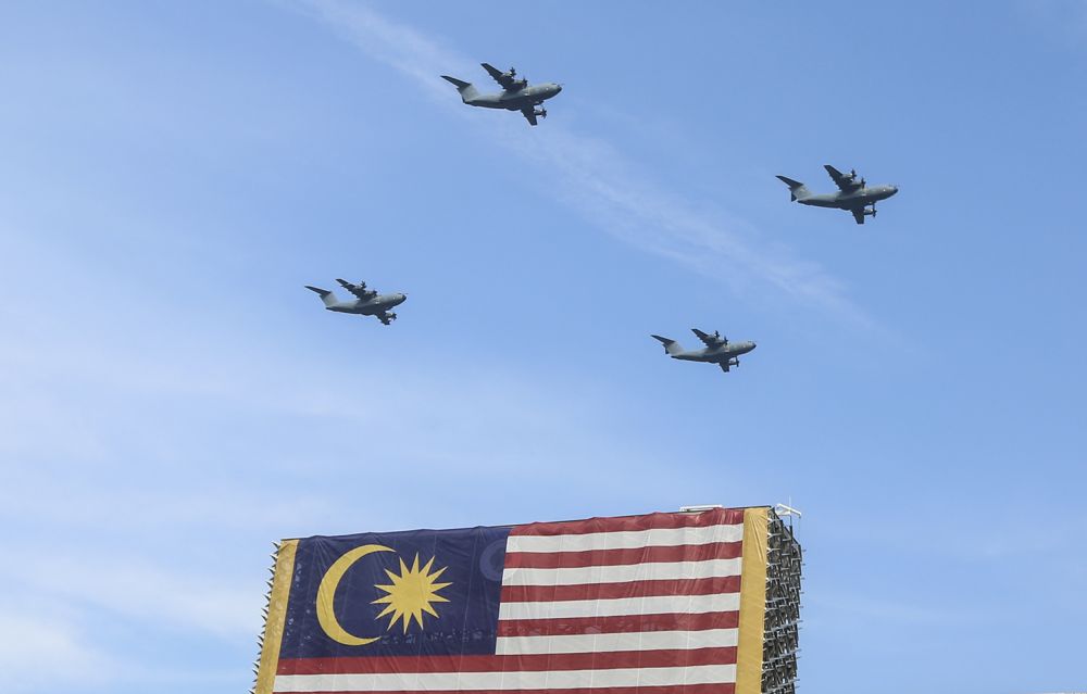 Royal Malaysian Air Force aircraft take to skies during the National Day parade at Dataran Putrajaya August 31, 2018. — Picture by Azneal Ishak