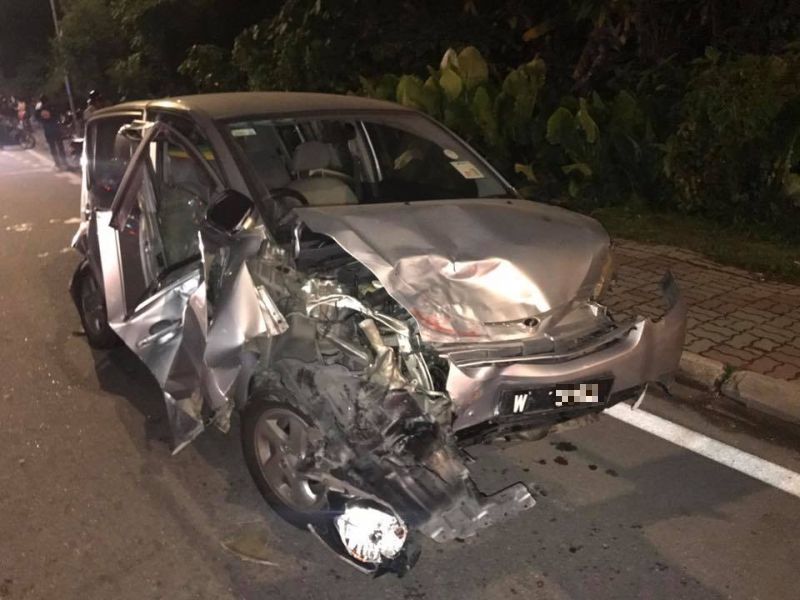 Another car damaged by the speeding RapidKL bus.