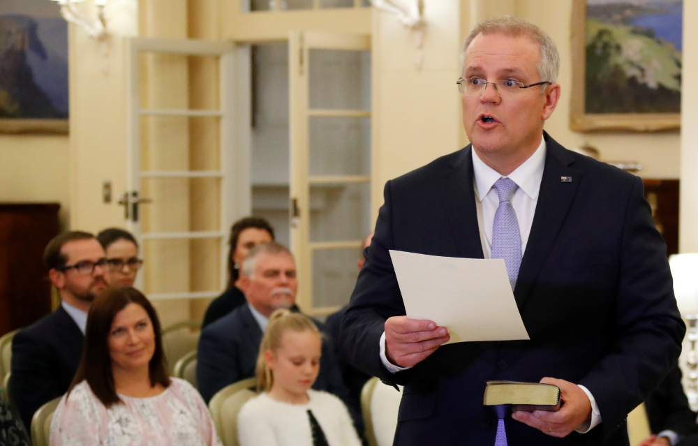 The new Australian Prime Minister Scott Morrison attends a swearing-in ceremony as his wife Jenny looks on, in Canberra August 24, 2018. u00e2u20acu201d Reuters pic