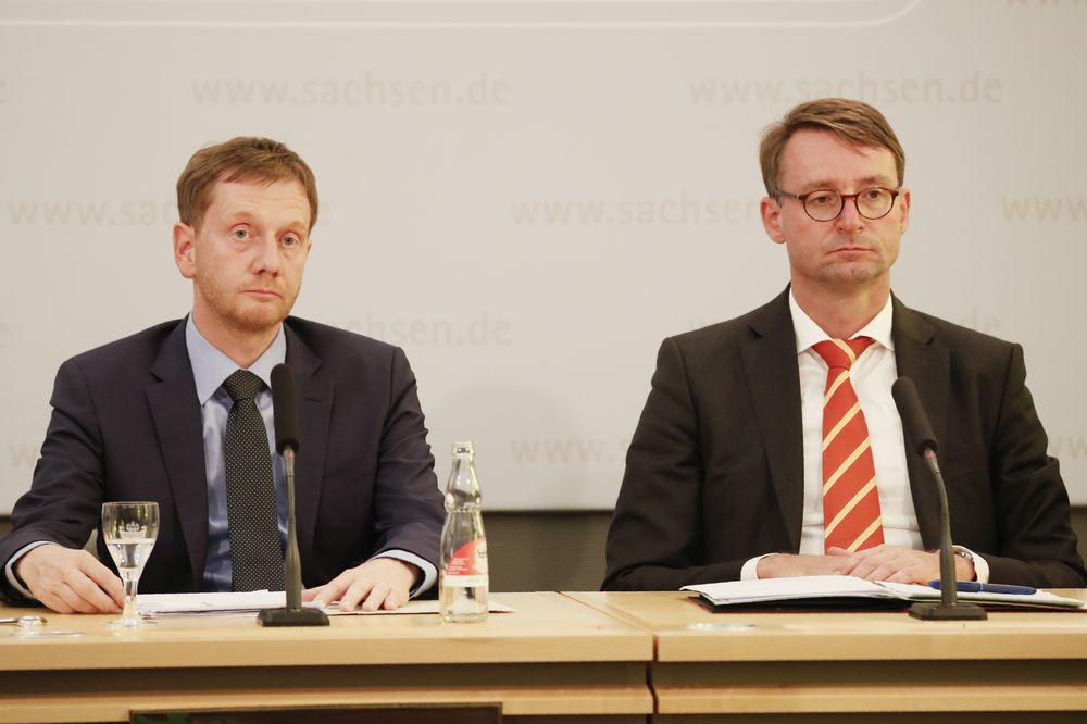 Minister President of Saxony, Michael Kretschmer (left) and Minister of the Interior of Saxony, Roland Woeller, look on during a joint press conference following the events of Chemnitz, on August 28, 2018 in Dresden, Germany. u00e2u20acu201d AFP pic