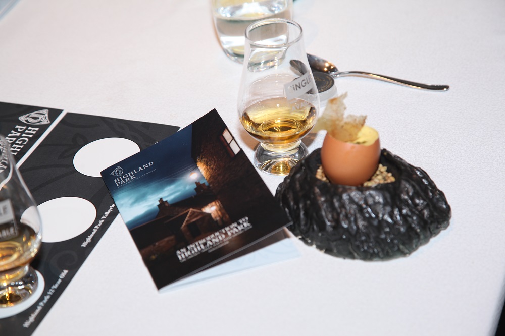 The iconic What Came First,  a combination of egg kalaki or light egg mousse with chicken skin crisp is served with Highland Park whisky.