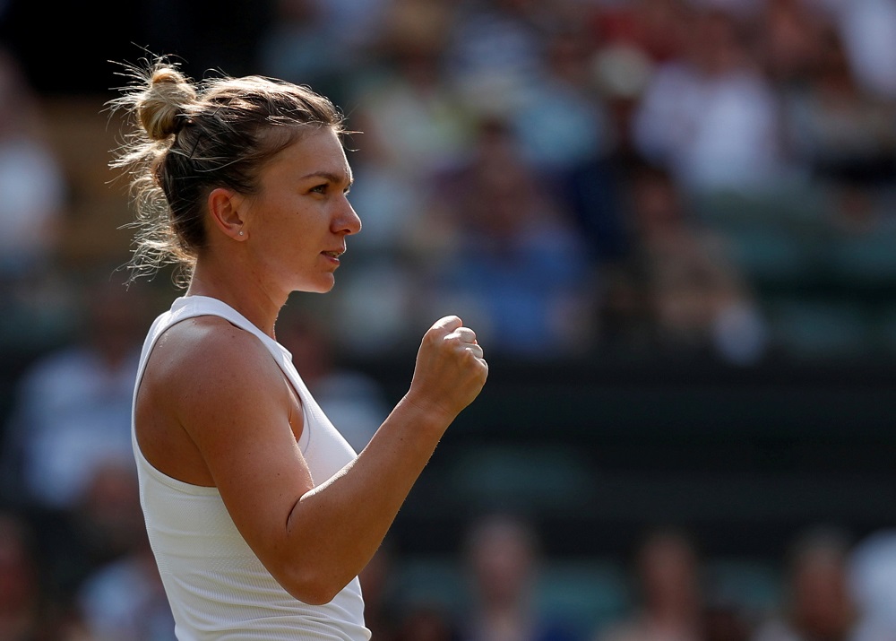 Romaniau00e2u20acu2122s Simona Halep celebrates winning the second round match against Chinau00e2u20acu2122s Saisai Zheng at the Wimbledon in London July 5, 2018. u00e2u20acu201d Reuters pic