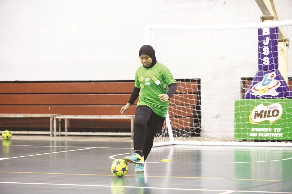 Futsal has helped Dhiya become a well-rounded person. 