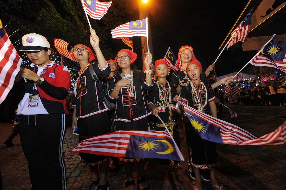 Participants get ready for 2018 Malaysia Day Celebrations at Padang Merdeka in Kota Kinabalu September 16, 2018. u00e2u20acu201d Picture by Shafwan Zaidon