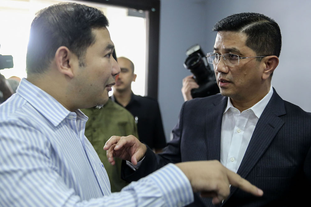 Datuk Seri Azmin Ali (right) and Rafizi Ramli at PKR headquarters in Petaling Jaya September 21, 2018. u00e2u20acu201d Picture by Yusof Mat Isa