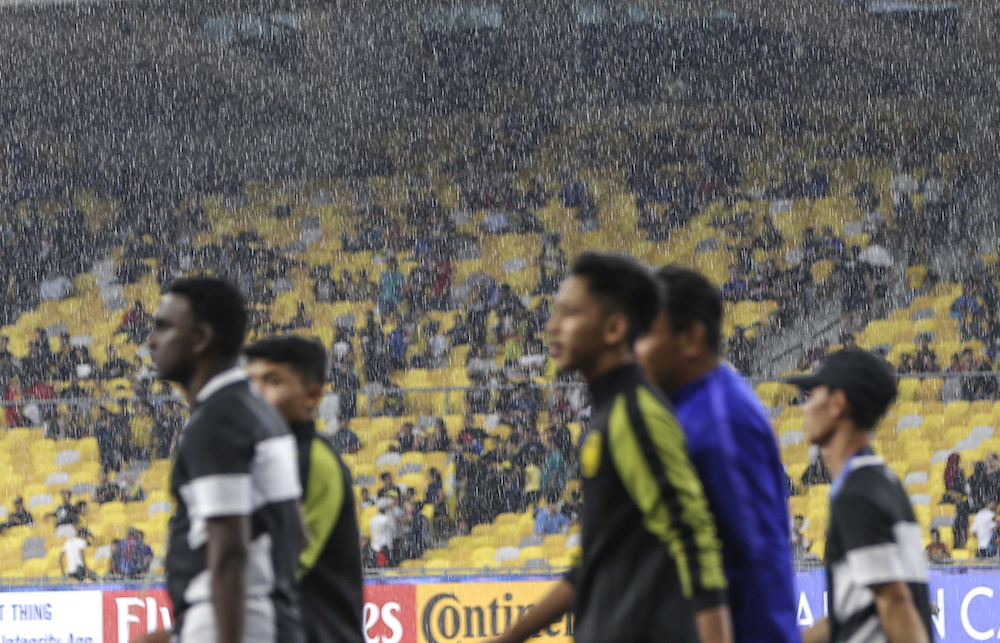 The Malaysia vs Japan AFC U16 football match was delayed due to heavy rain at the National Stadium, Bukit Jalil in Kuala Lumpur September 26, 2018. u00e2u20acu201d Picture by Azneal Ishak