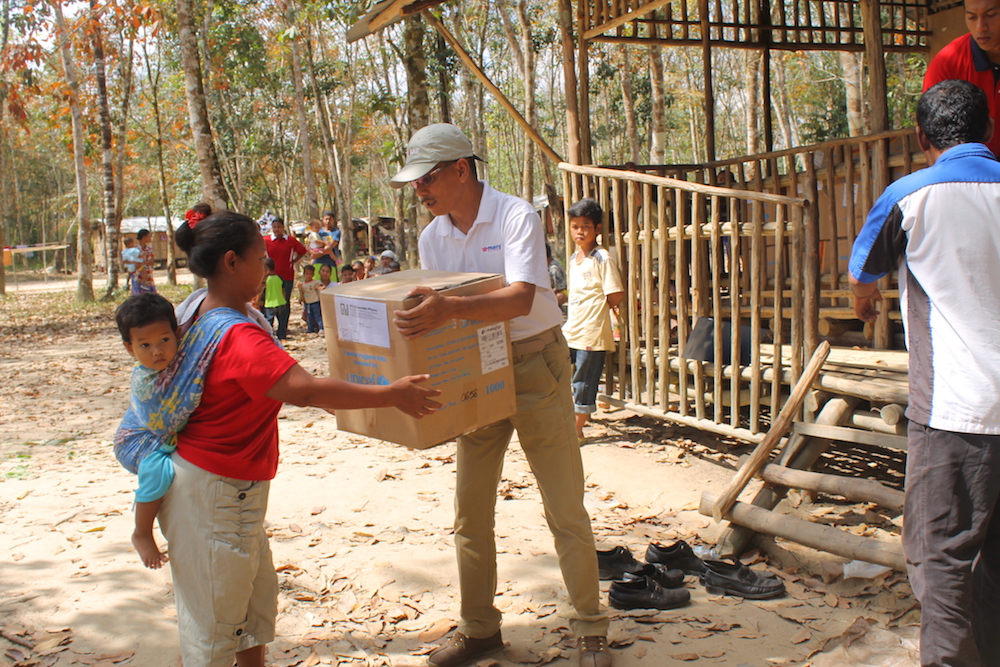 Partnering with Unicef to hand out hygiene kits to Gua Musang residents after the great Kelantan flood in 2015. u00e2u20acu201d Picture courtesy of Mercy Malaysia