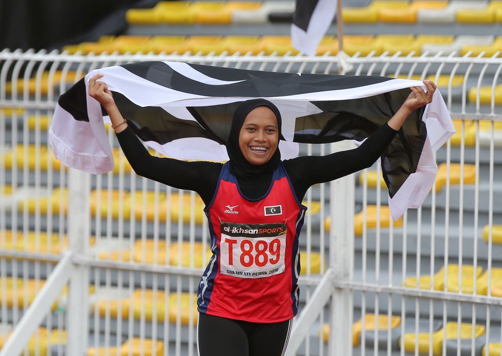 Azreen won gold for Terengganu with a time of 11.81s u00e2u20acu201d 0.01 seconds faster than the previous record set by Johoru00e2u20acu2122s Siti Fatima in 2008. u00e2u20acu201d Picture by Marcus Pheong