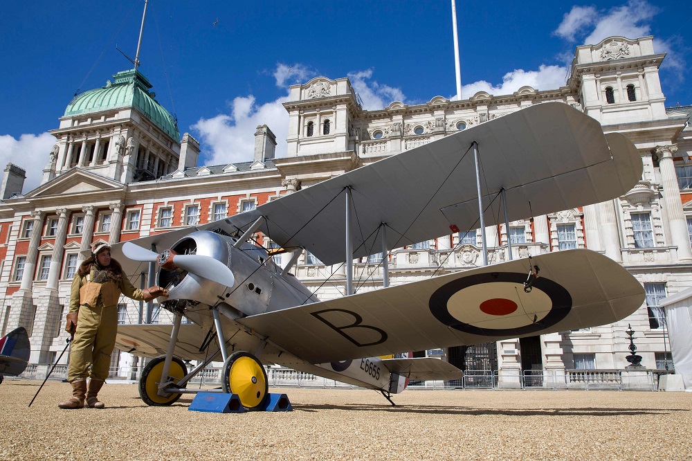 In this file photo taken on March 31, 2016, a Royal Air Force Museum employee poses for a photograph with a World War One (WWI) Sopwith Snipe fighter plane, in London. u00e2u20acu201d AFP pic