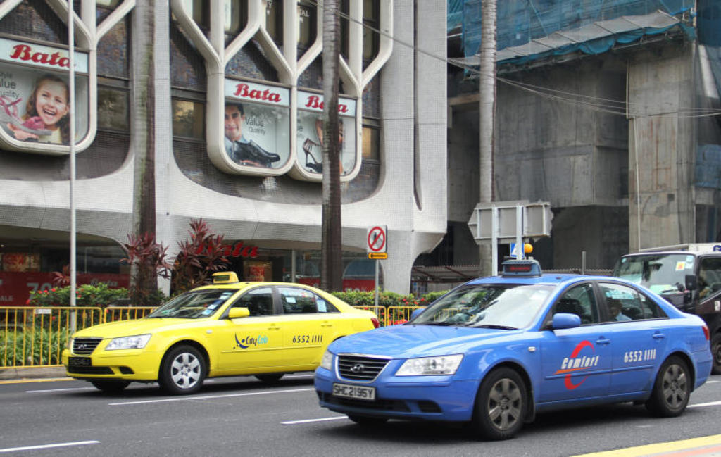 Singaporeu00e2u20acu2122s largest taxi operator ComfortDelGro, which has seen a rise in the number of bookings following ride-hailing operator Uberu00e2u20acu2122s exit in May, said the new levy structure is to encourage even more cabbies to take up bookings. u00e2u20acu201d TODAY pic