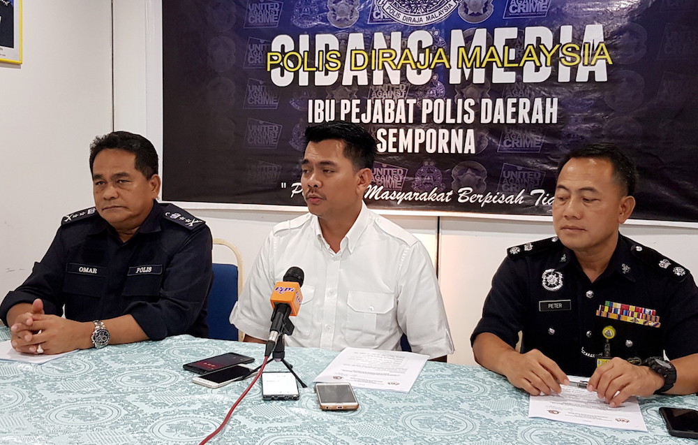 Deputy Home Minister Datuk Mohd Azis Jamman speaks during a press conference in Tawau September 12, 2018. u00e2u20acu201d Bernama pic