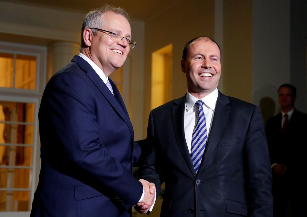 File picture shows the new Australian Prime Minister Scott Morrison shaking hands with the new Treasurer Josh Frydenberg after the swearing-in ceremony in Canberra, Australia, August 24, 2018. u00e2u20acu201d Reuters pic