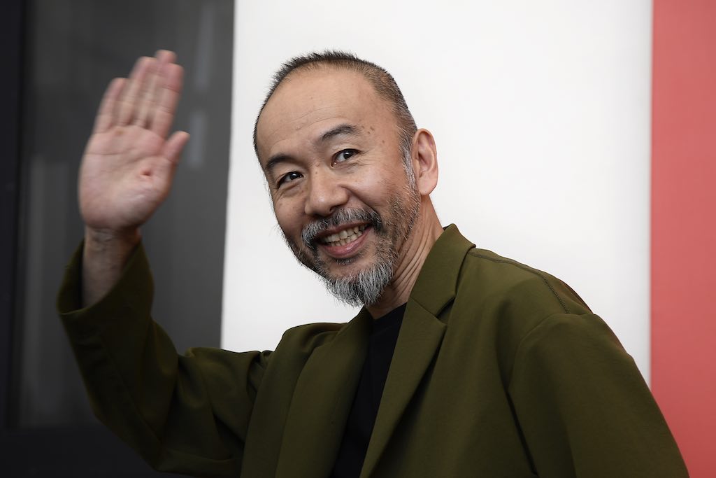 Director and actor Shinya Tsukamoto waves as he leaves following a photocall for the film u00e2u20acu02dcZanu00e2u20acu2122 (Killing) presented in competition on September 7, 2018 during the 75th Venice Film Festival at Venice Lido. u00e2u20acu201d AFP picnn