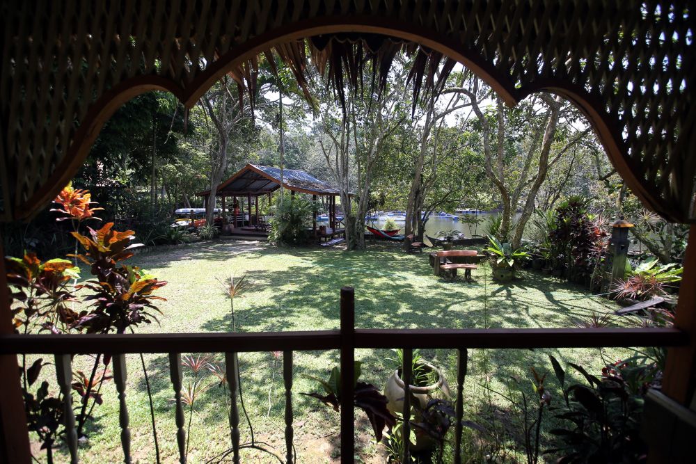 Suka-Suka Lake Retreat offers traditional Malay style houses for customers. u00e2u20acu201d Picture by Farhan Najib